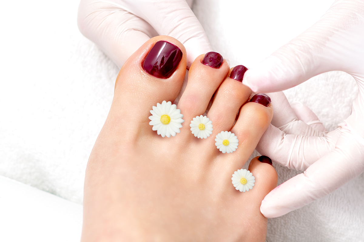 Jolifin pedicure toe separators - Daisies single 